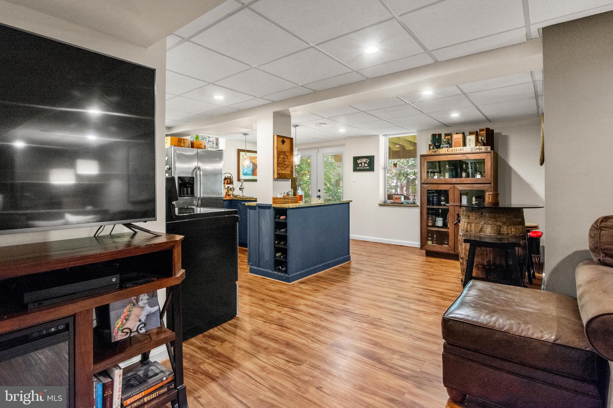 8504 Summershade Drive Odenton, MD 21113 - Photo 61 of 92 a living room with stainless steel appliances kitchen island granite countertop furniture and a kitchen view