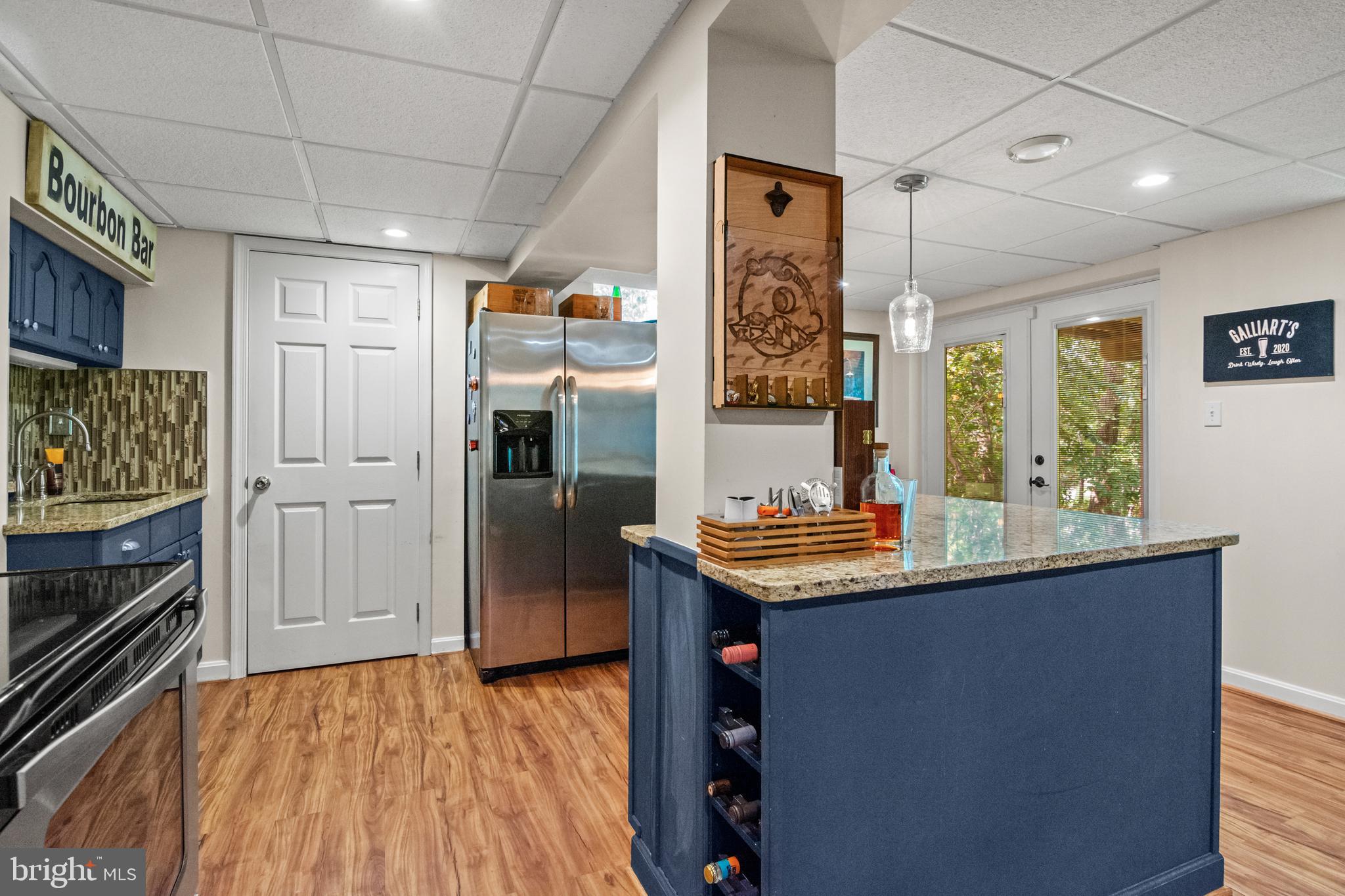 8504 Summershade Drive Odenton, MD 21113 - Photo 67 of 92 a kitchen with stainless steel appliances granite countertop a sink and cabinets