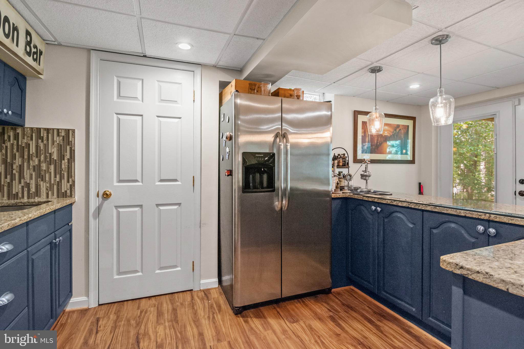 8504 Summershade Drive Odenton, MD 21113 - Photo 68 of 92 a kitchen with stainless steel appliances granite countertop a refrigerator and a sink