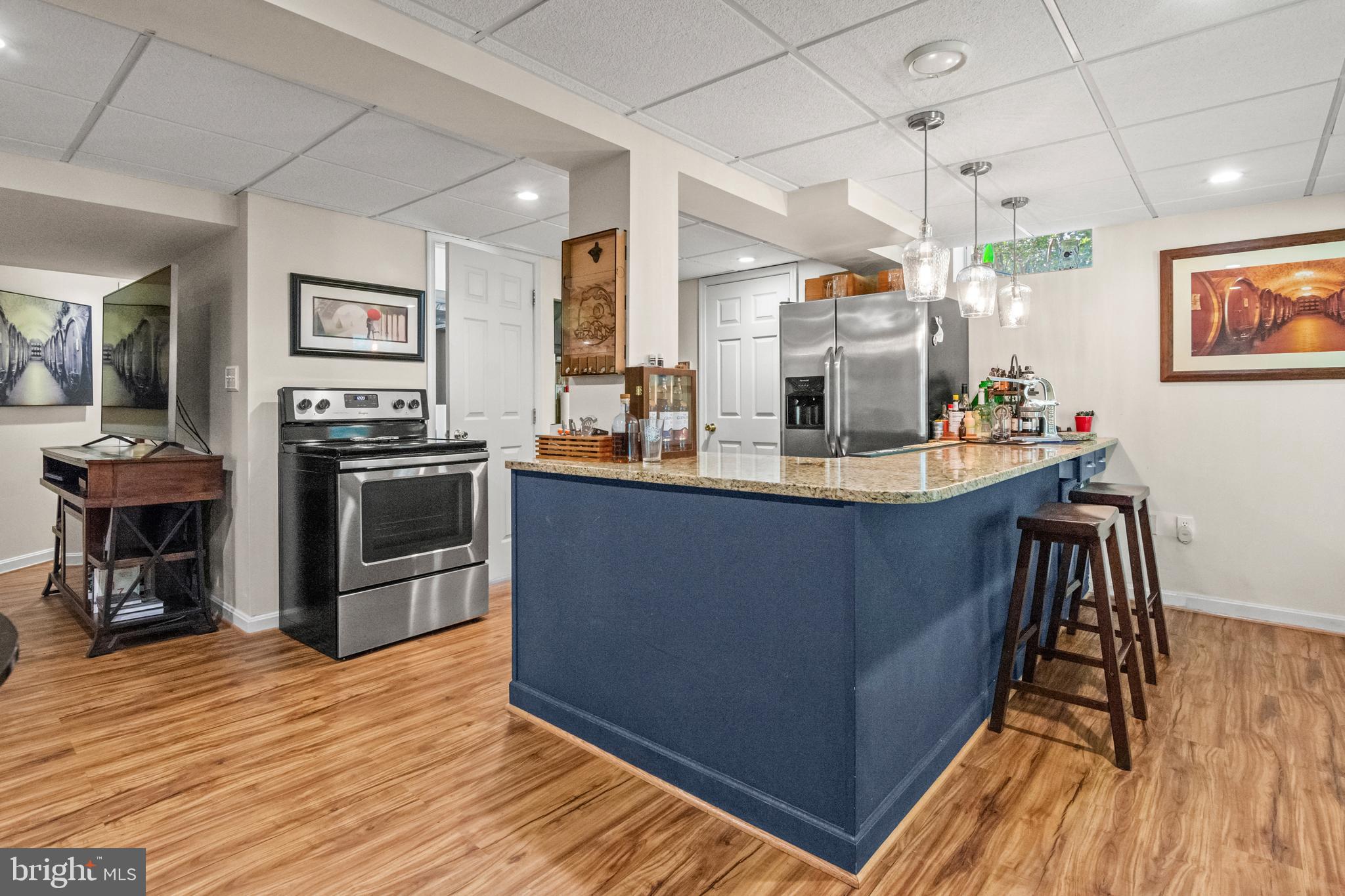 8504 Summershade Drive Odenton, MD 21113 - Photo 69 of 92 a kitchen with sink cabinets and wooden floor