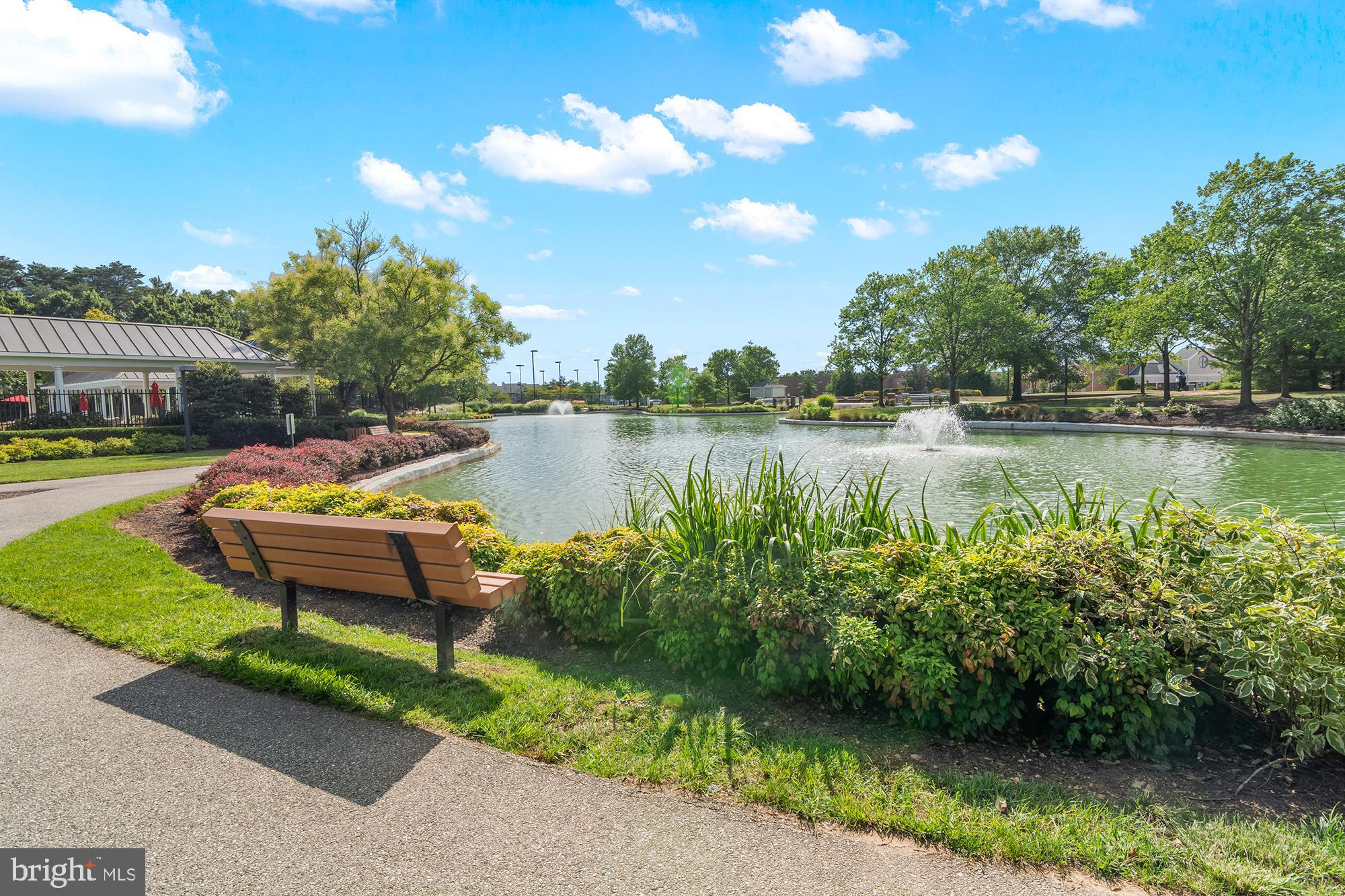8504 Summershade Drive Odenton, MD 21113 - Photo 88 of 92 a view of a lake with houses in the back