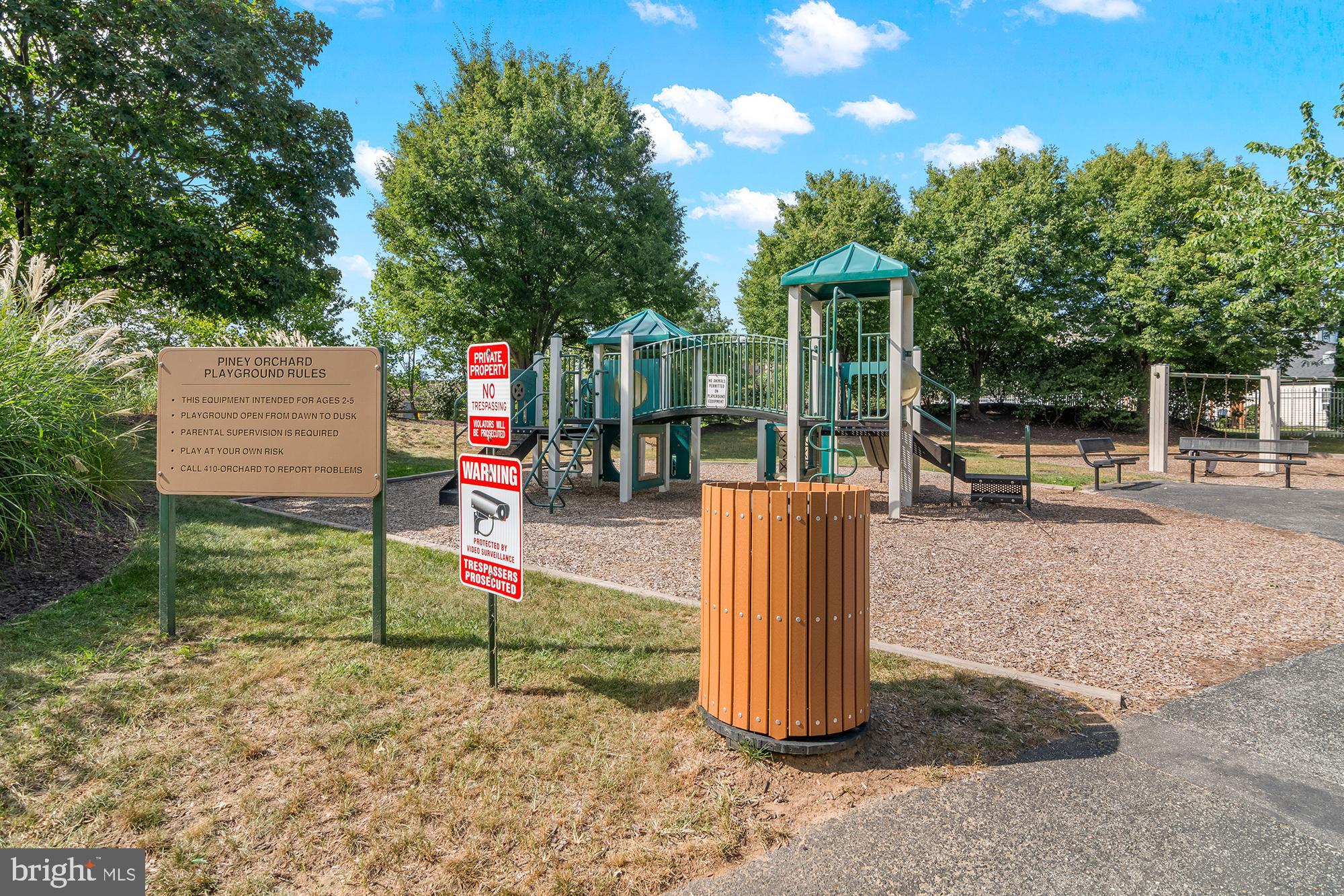 8504 Summershade Drive Odenton, MD 21113 - Photo 90 of 92 a view of a park with swings and slides