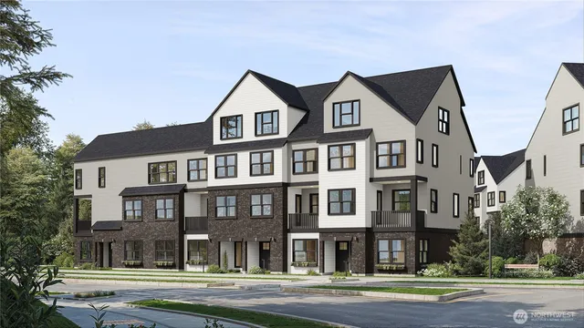 a view of an white house with a yard