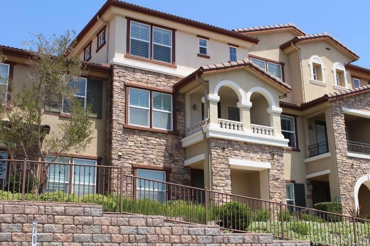 1912 Montilla Street Santee, CA 92071 - Photo 1 of 1 a front view of a house with a garden