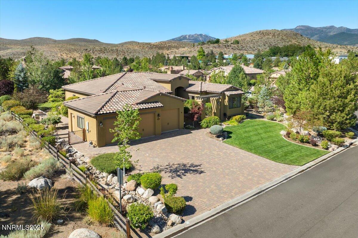 3880 Boulder Patch Reno, NV 89511 - Photo 2 of 53 an aerial view of a house with a garden