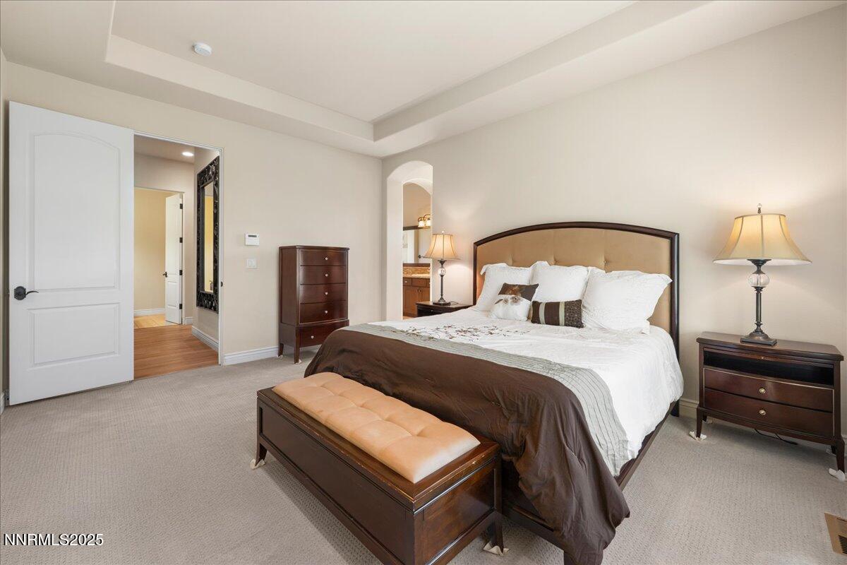 3880 Boulder Patch Reno, NV 89511 - Photo 23 of 53 a bedroom with a bed and a lamp