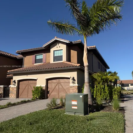front view of a house with a street