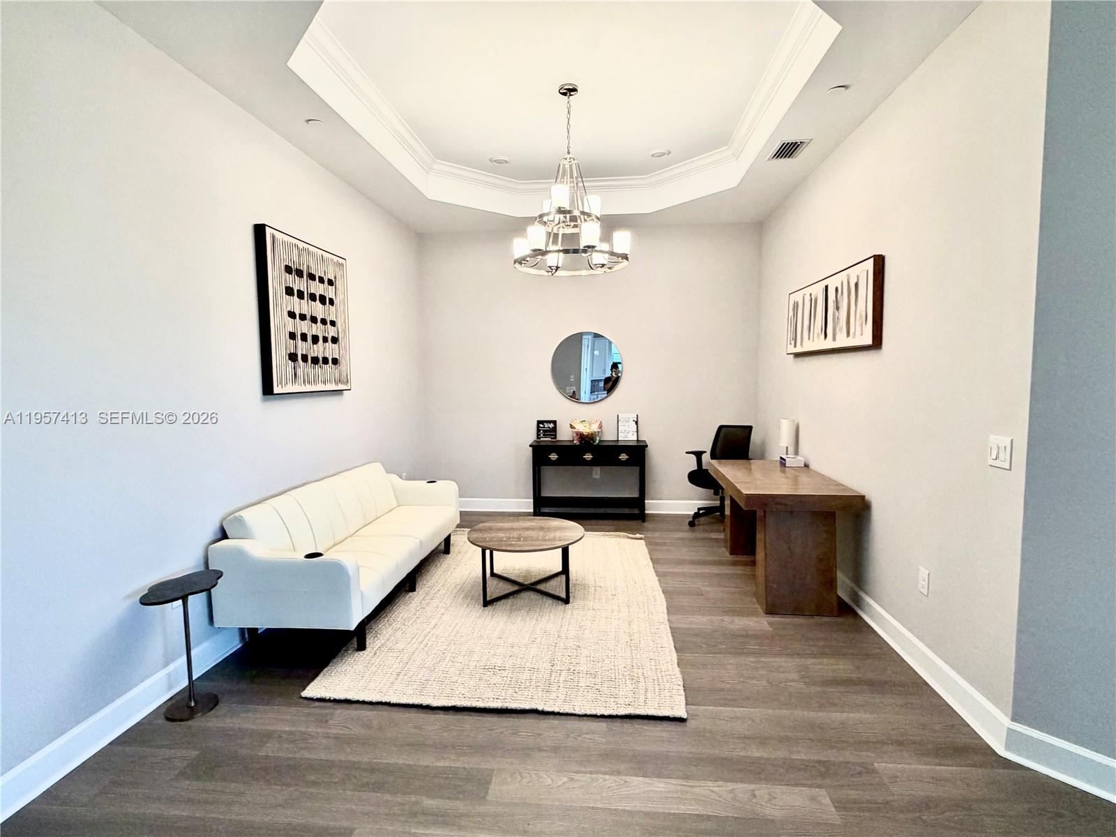 15323 Lucerna Street, Unit 204 Naples, FL 34114 - Photo 12 of 29 a living room with furniture a rug and a window
