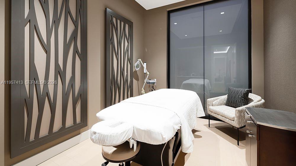 15323 Lucerna Street, Unit 204 Naples, FL 34114 - Photo 17 of 29 a bathroom with a bathtub and shower