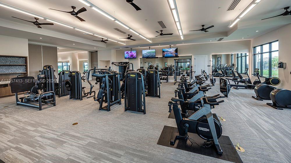 15323 Lucerna Street, Unit 204 Naples, FL 34114 - Photo 22 of 29 a view of a room with gym equipment