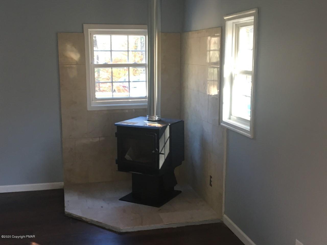 257 Zoe Road Pocono Lake, PA 18347 - Photo 17 of 28 wood stove