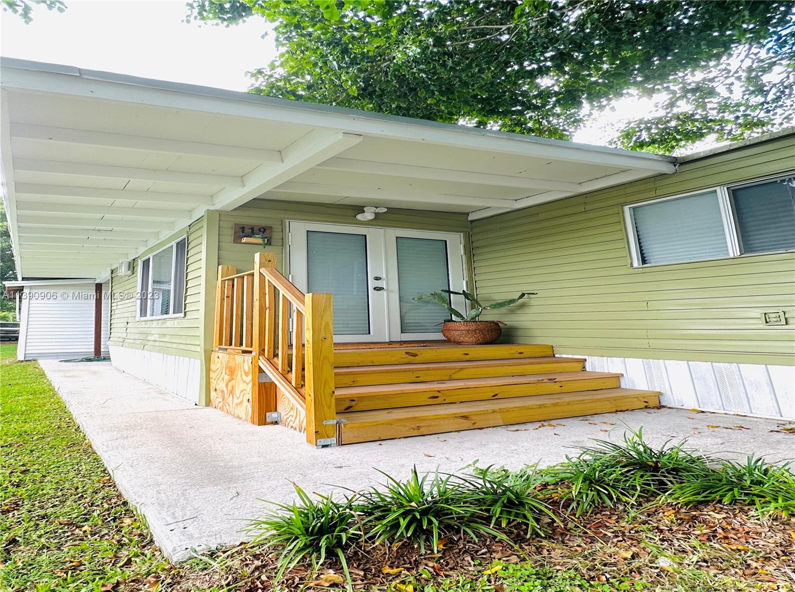 451 Southeast 8th Street Homestead, FL 33030 - Photo 2 of 10 a view of a house with a patio