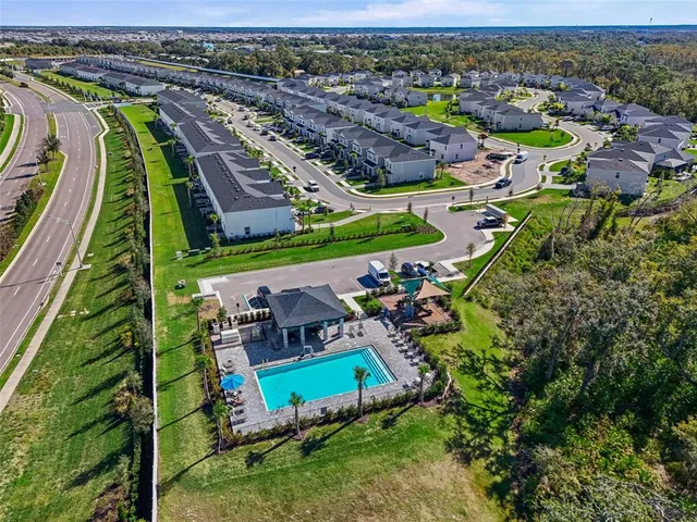 an aerial view of a house with a garden