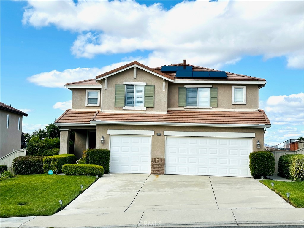 33878 Channel Street Temecula, CA 92592 - Photo 1 of 14 a front view of a house with yard