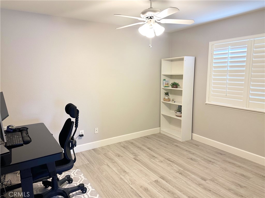 33878 Channel Street Temecula, CA 92592 - Photo 6 of 14 a view of a workspace with furniture and a window