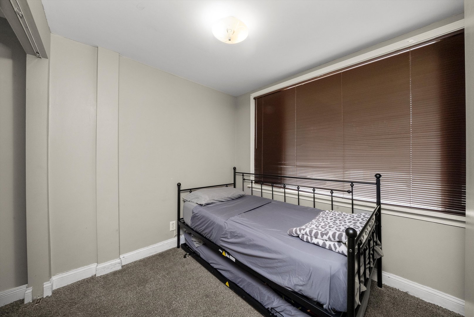 8808 South Loomis Street Chicago, IL 60620 - Photo 18 of 32 a view of bedroom with furniture and screen