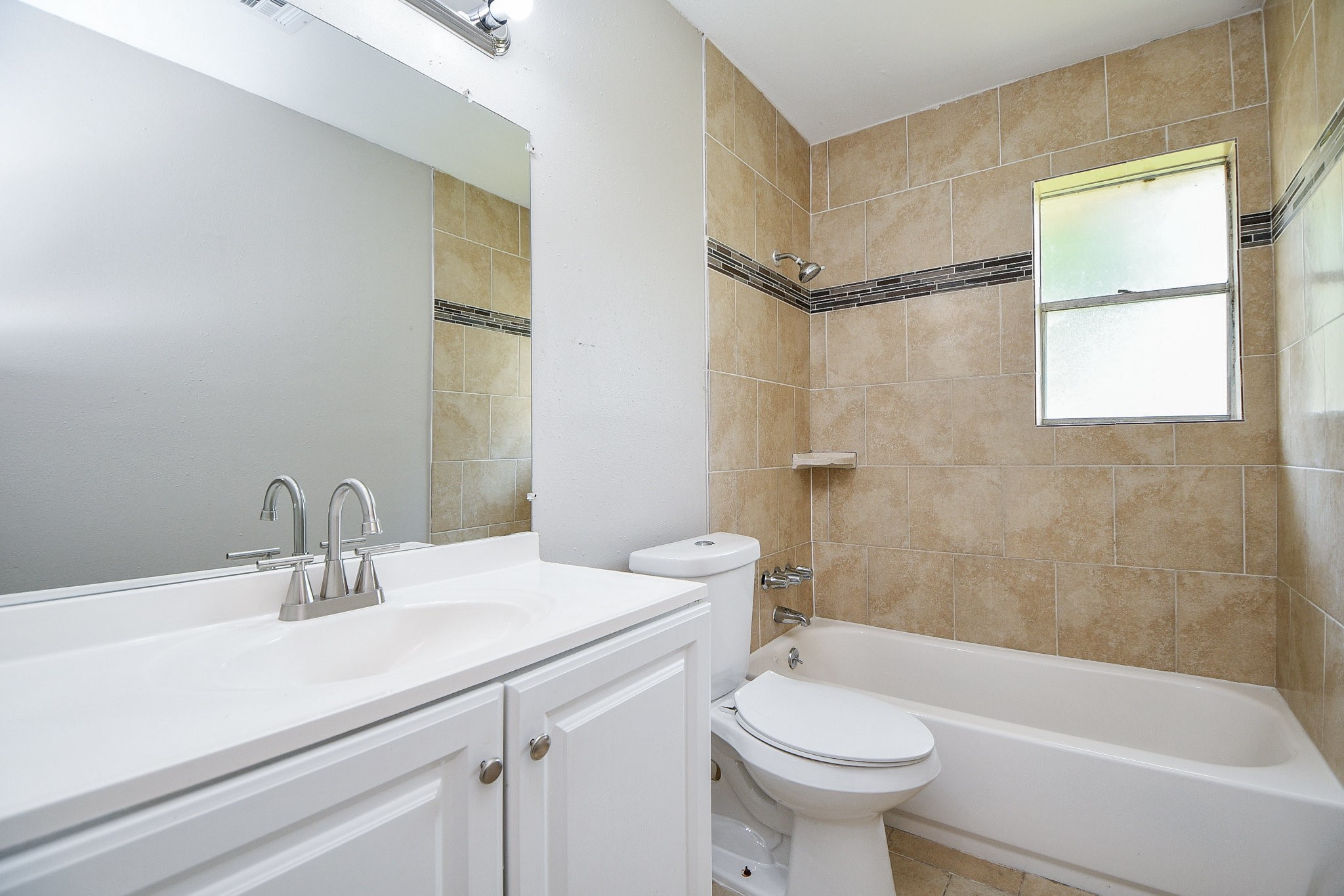 14902 Gloster Street Channelview, TX 77530 - Photo 15 of 21 a bathroom with a sink a toilet and shower