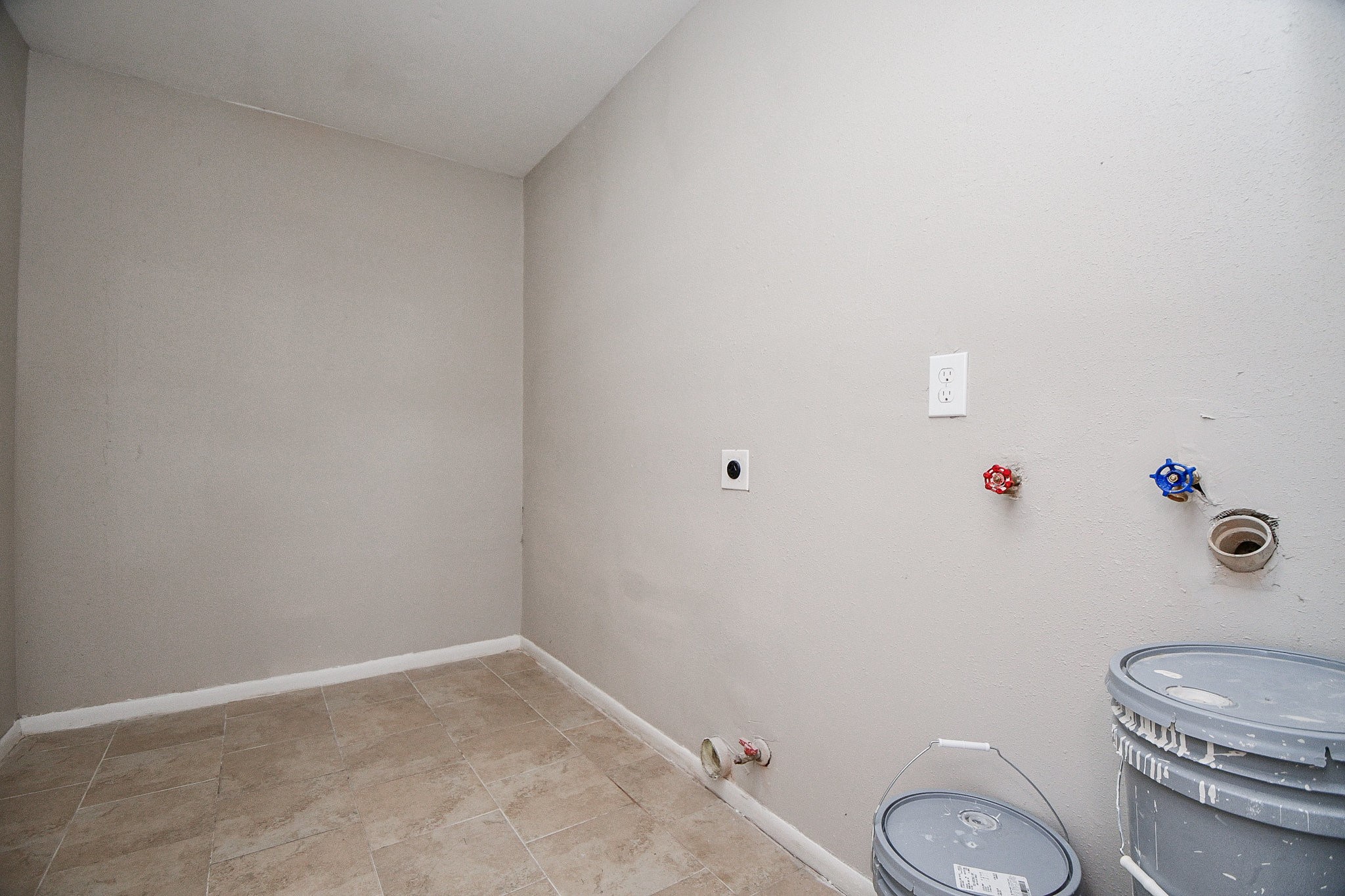 14902 Gloster Street Channelview, TX 77530 - Photo 16 of 21 a white toilet sitting next to a white sink and vanity