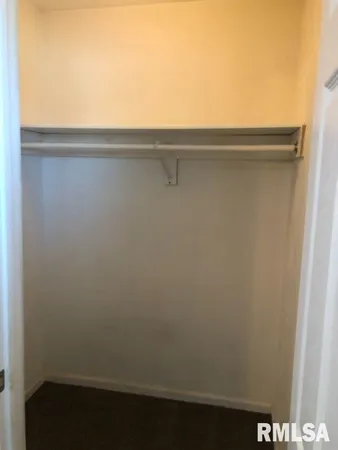 a view of small space with racks on the wall