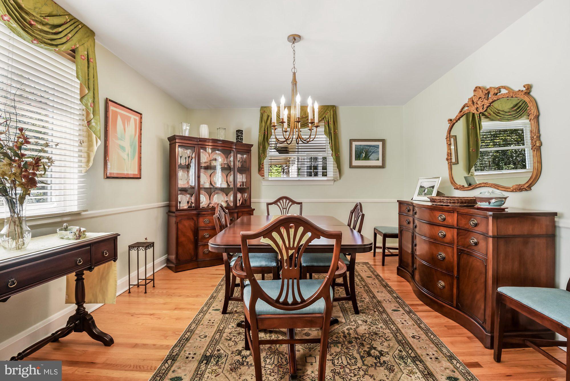 2108 Carterdale Road Baltimore, MD 21209 - Photo 5 of 22 Dining room with wood floors
