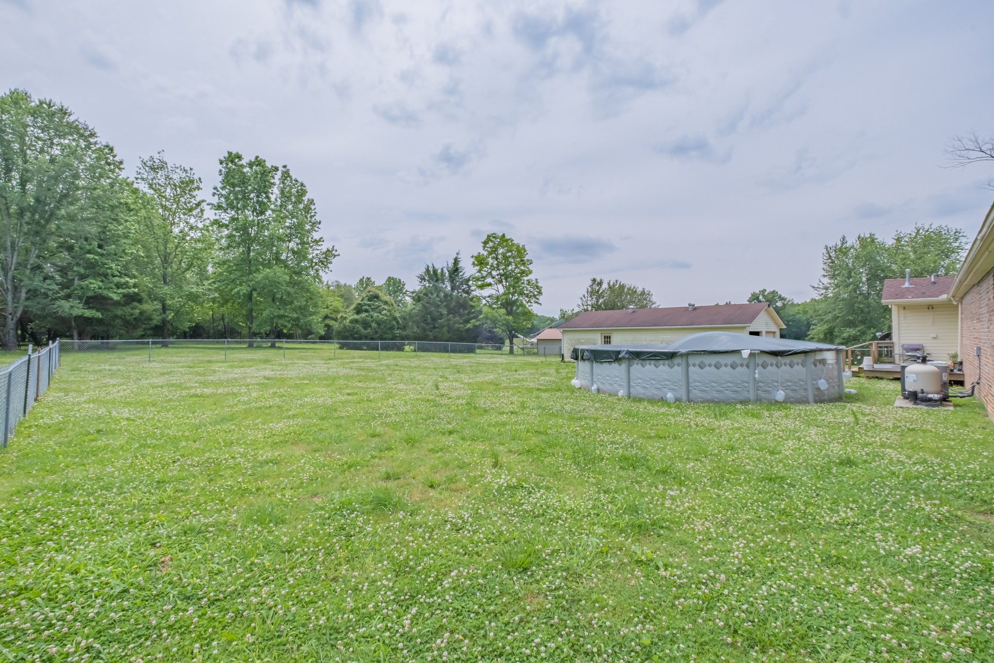 11 Henry Thompson Road Taft, TN 38488 - Photo 17 of 57 a backyard of a house with lots of green space