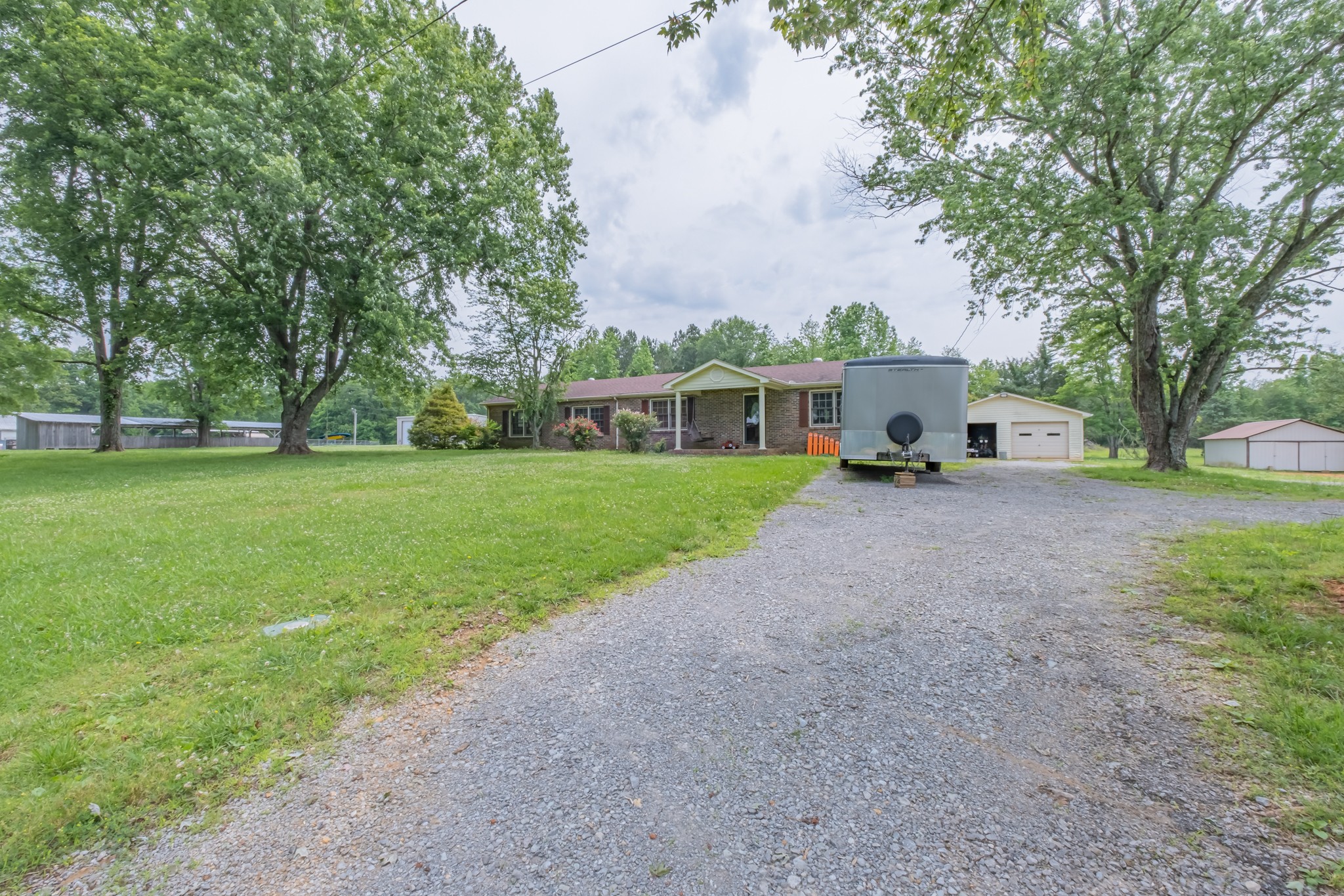 11 Henry Thompson Road Taft, TN 38488 - Photo 8 of 57 a view of a house with a yard