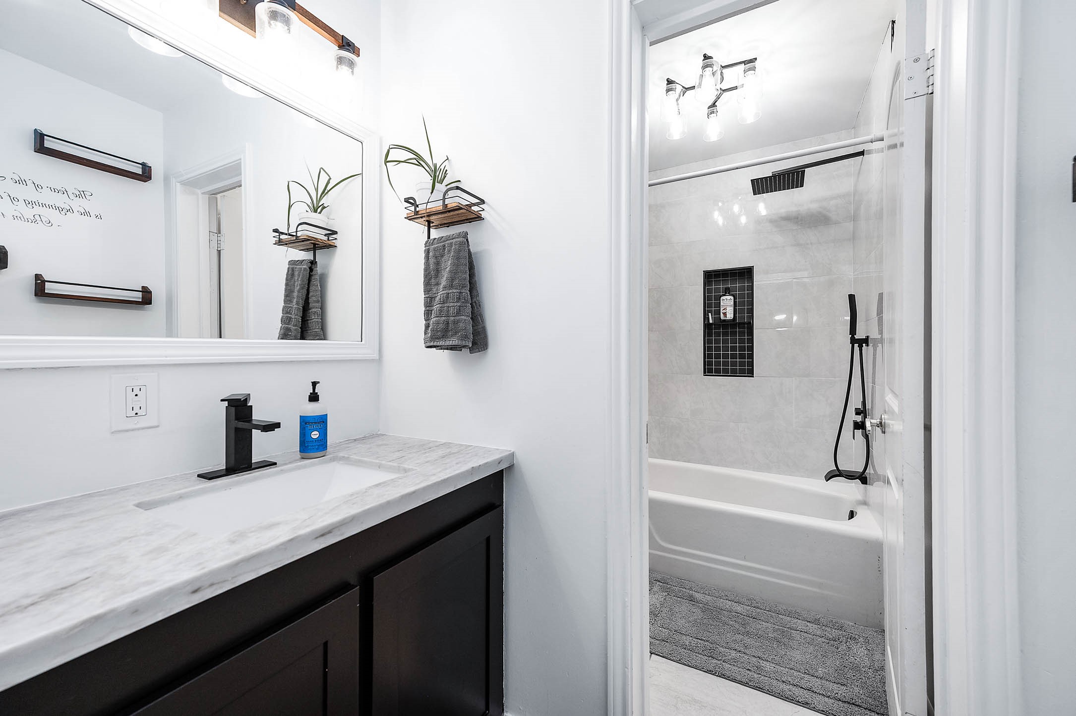 1619 County Road 387 Rosharon, TX 77583 - Photo 21 of 49 This hallway full bathroom features a stunning remodel, including quartz counters and a shower/tub combination.”