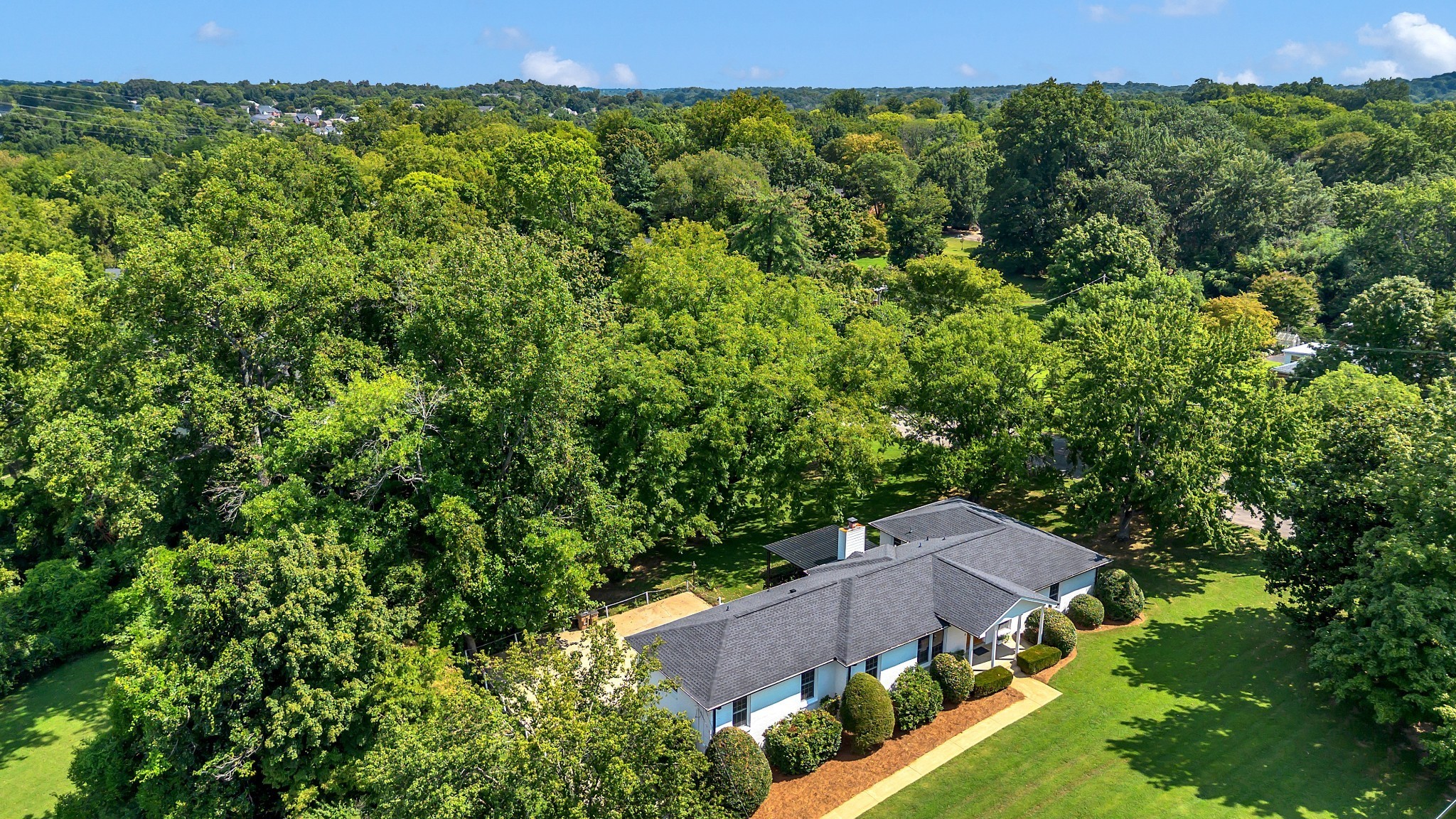 608 Hill Road Nashville, TN 37220 - Photo 1 of 44 an aerial view of a house with mountain view