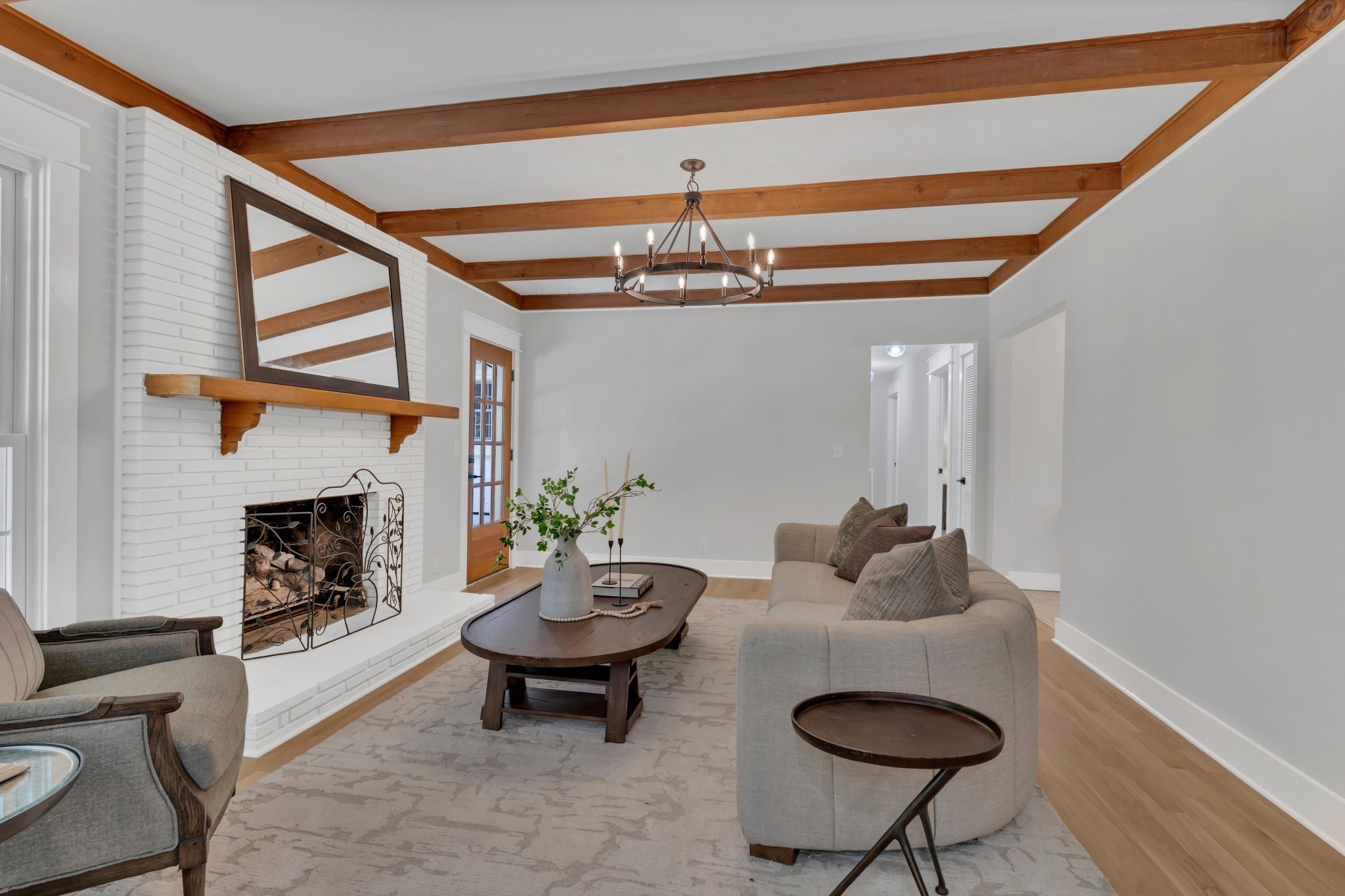 608 Hill Road Nashville, TN 37220 - Photo 15 of 44 a living room with furniture a fireplace and a table