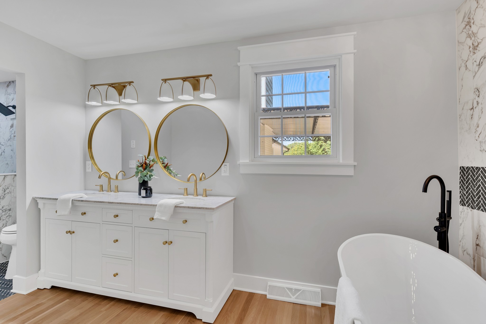 608 Hill Road Nashville, TN 37220 - Photo 30 of 44 a bathroom with a toilet sink and mirror