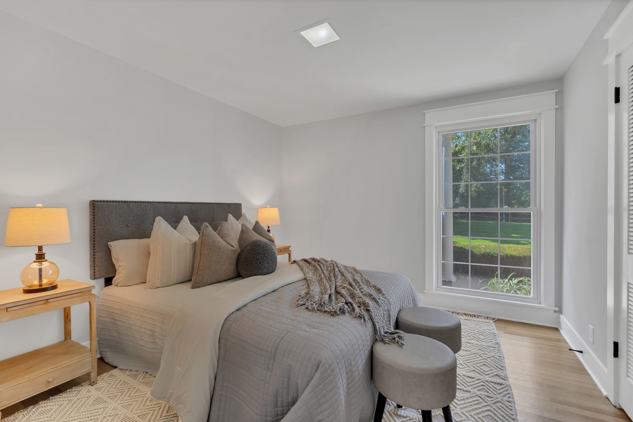 608 Hill Road Nashville, TN 37220 - Photo 38 of 44 a bed sitting in a bedroom next to a window