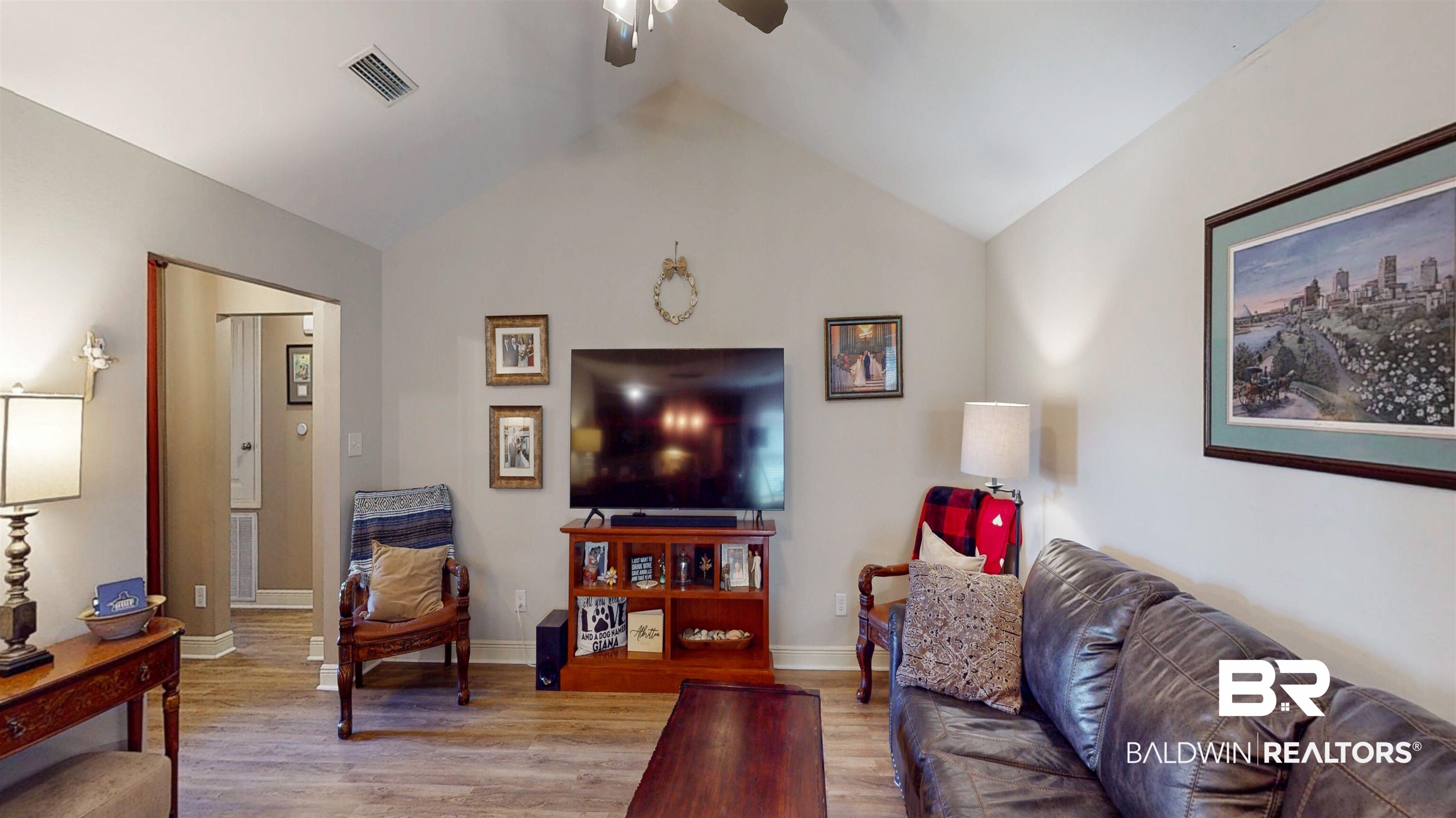 1304 Majesty Loop Foley, AL 36535 - Photo 4 of 44 Living room with ceiling fan and wood finished floors