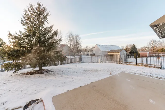 a view of road with a building in the background