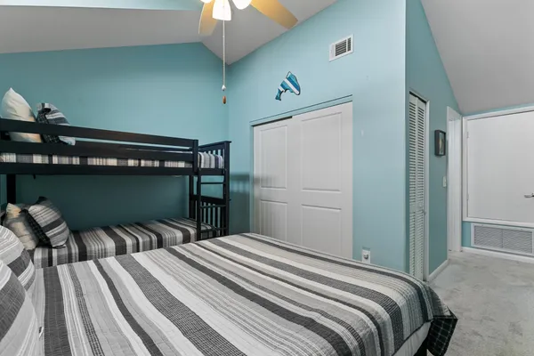 an aerial view of residential building and an ocean