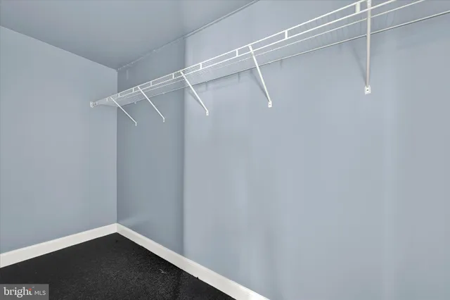 a view of a room with racks on the wall