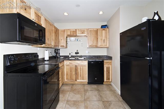 1739 Ascot Road Colorado Springs, CO 80906 - Photo 6 of 19