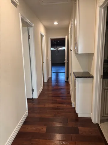 a view of entryway with wooden floor