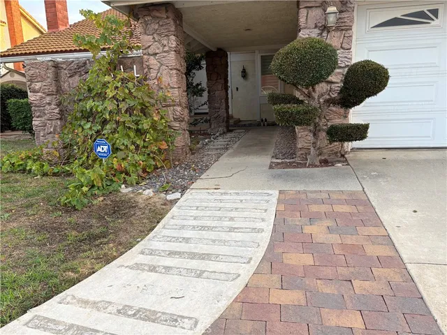 a view of backyard with sitting area