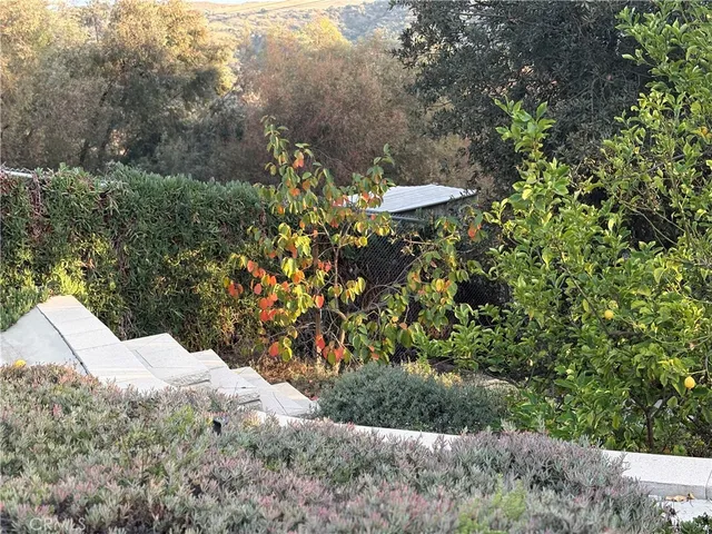 a view of a house with pool and porch
