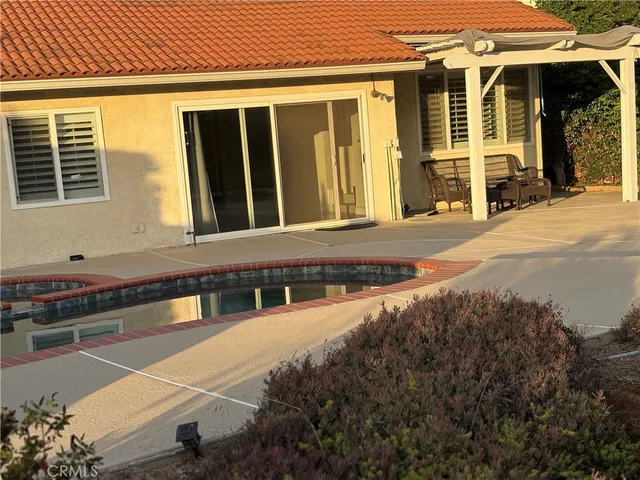 a view of outdoor space and backyard