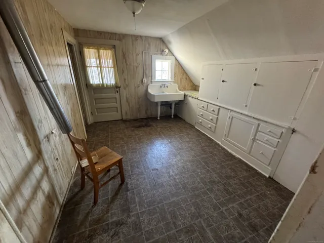 a view of a house with a street