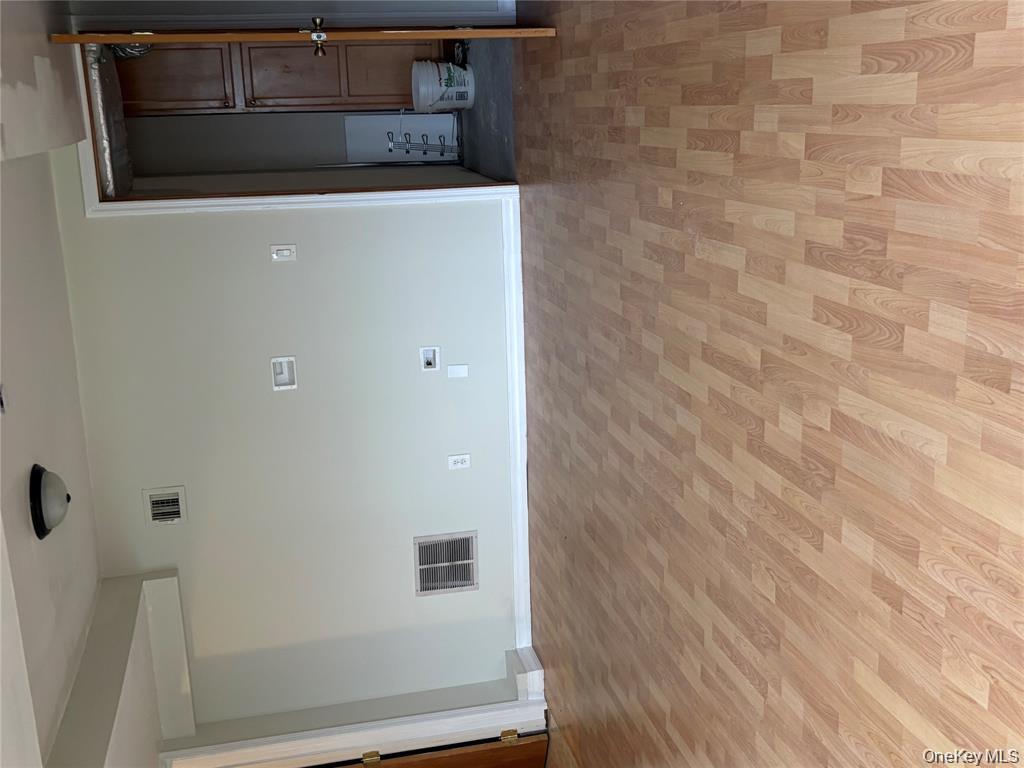 80 Harbor Beach Road Miller Place, NY 11764 - Photo 6 of 10 a view of an empty room