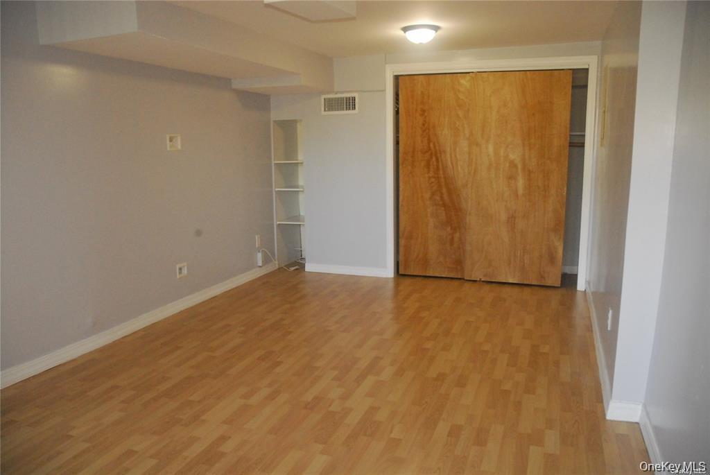 80 Harbor Beach Road Miller Place, NY 11764 - Photo 8 of 10 a view of an empty room