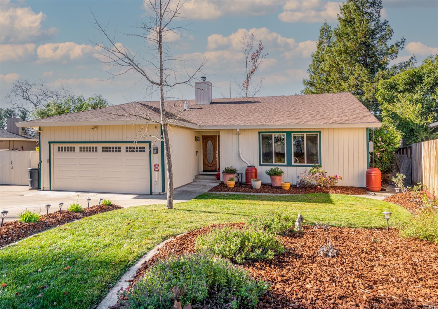 675 Montclair Drive Santa Rosa, CA 95409 - Photo 1 of 1 a view of a house with backyard porch and sitting area