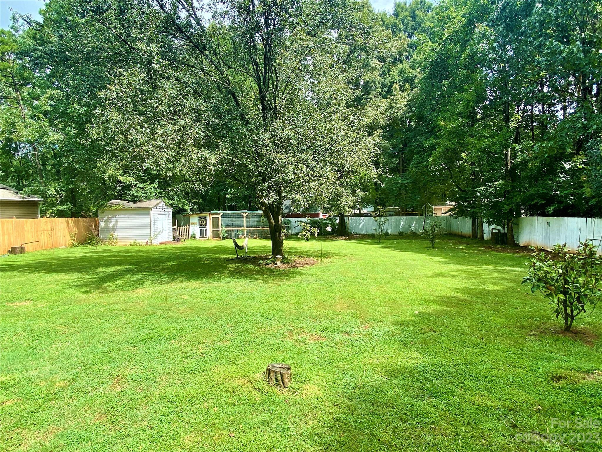 9701 Hambright Road Huntersville, NC 28078 - Photo 12 of 17 a view of a house with a yard