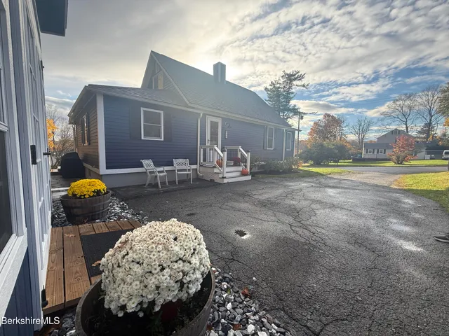 a view of a swimming pool with a lounge chairs
