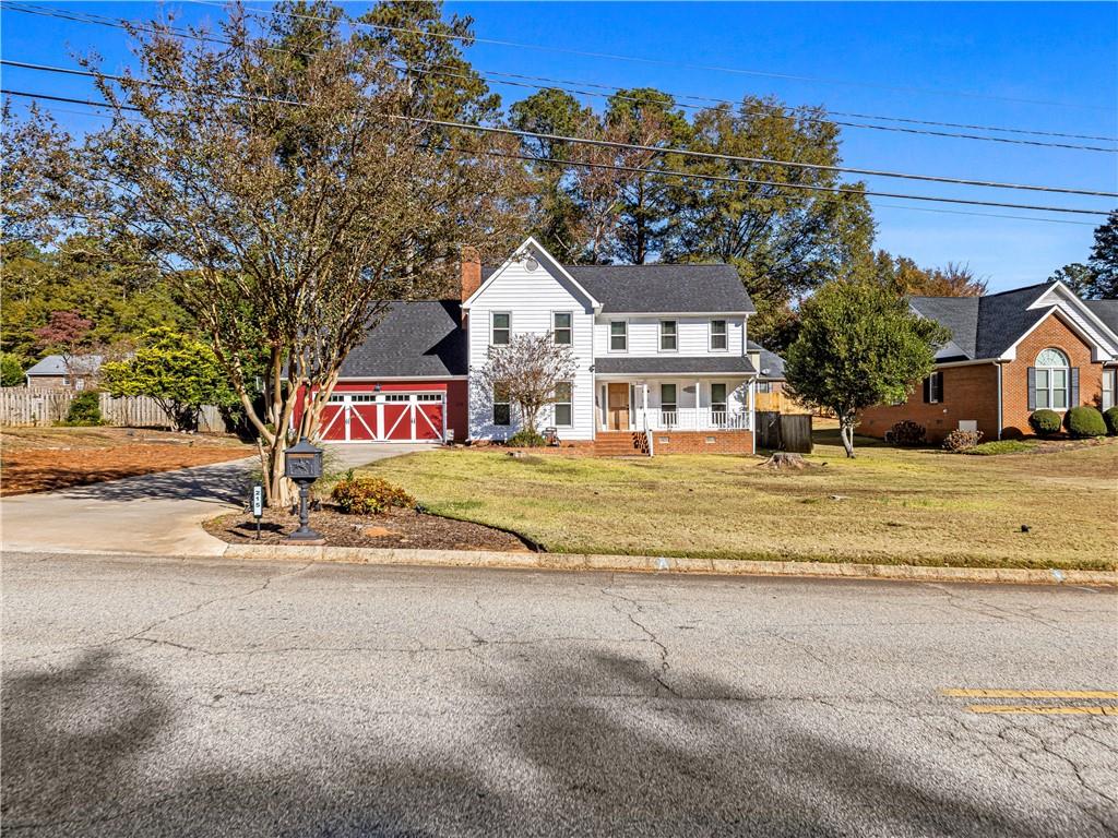 215 Pineywood Road Griffin, GA 30224 - Photo 2 of 49 a view of houses with a street