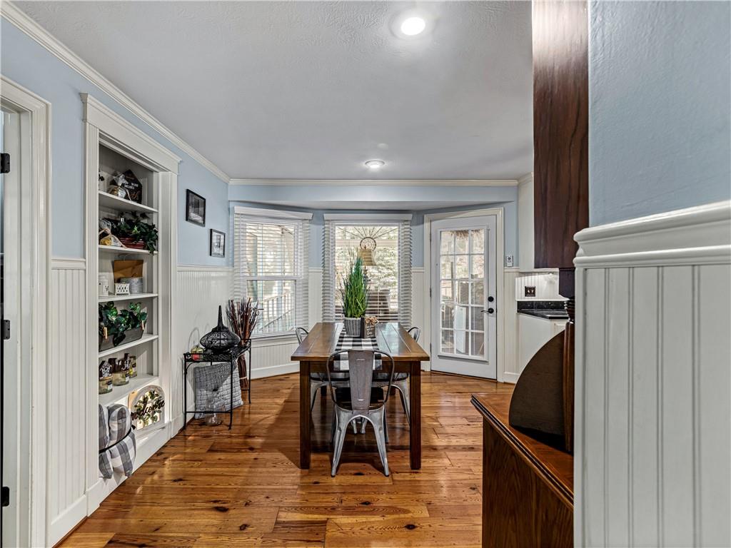 215 Pineywood Road Griffin, GA 30224 - Photo 25 of 49 a living room with furniture a rug and a window