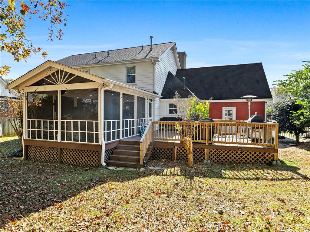 215 Pineywood Road Griffin, GA 30224 - Photo 46 of 49 a view of a chair and table in the backyard