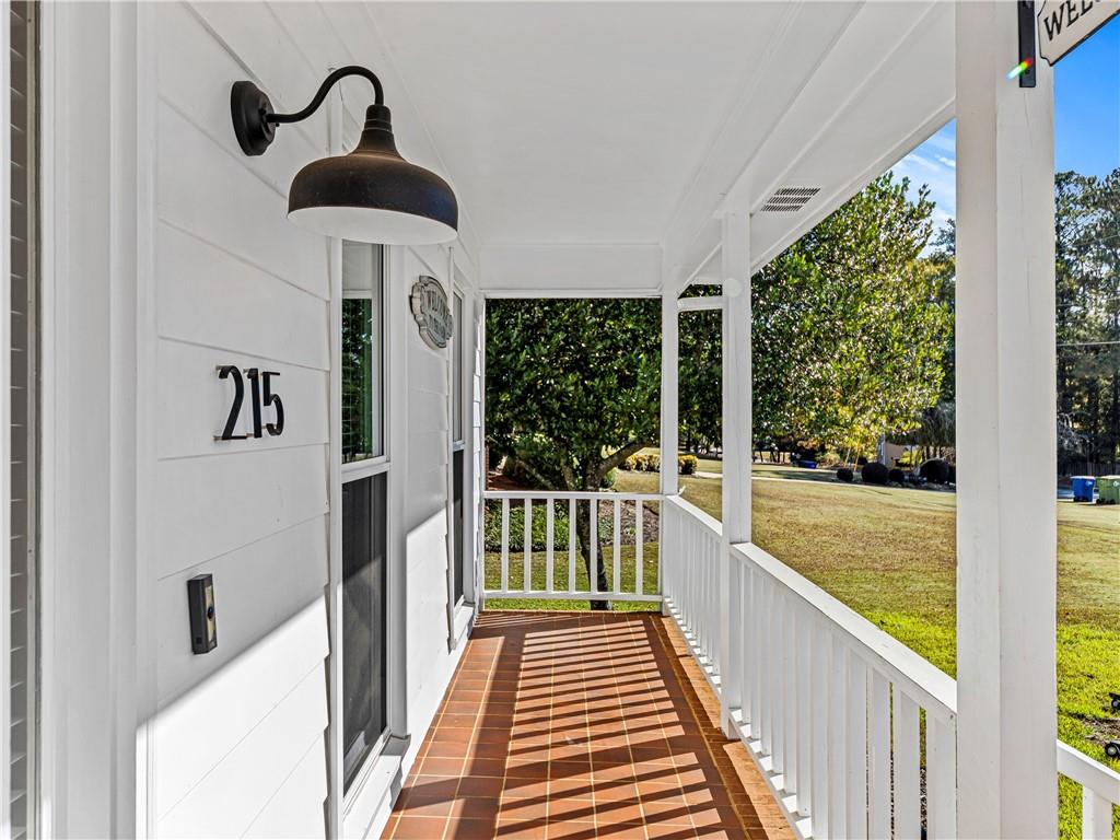 215 Pineywood Road Griffin, GA 30224 - Photo 8 of 49 a view of a balcony with door